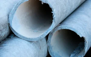 Asbestos-containing fiber cement pipe